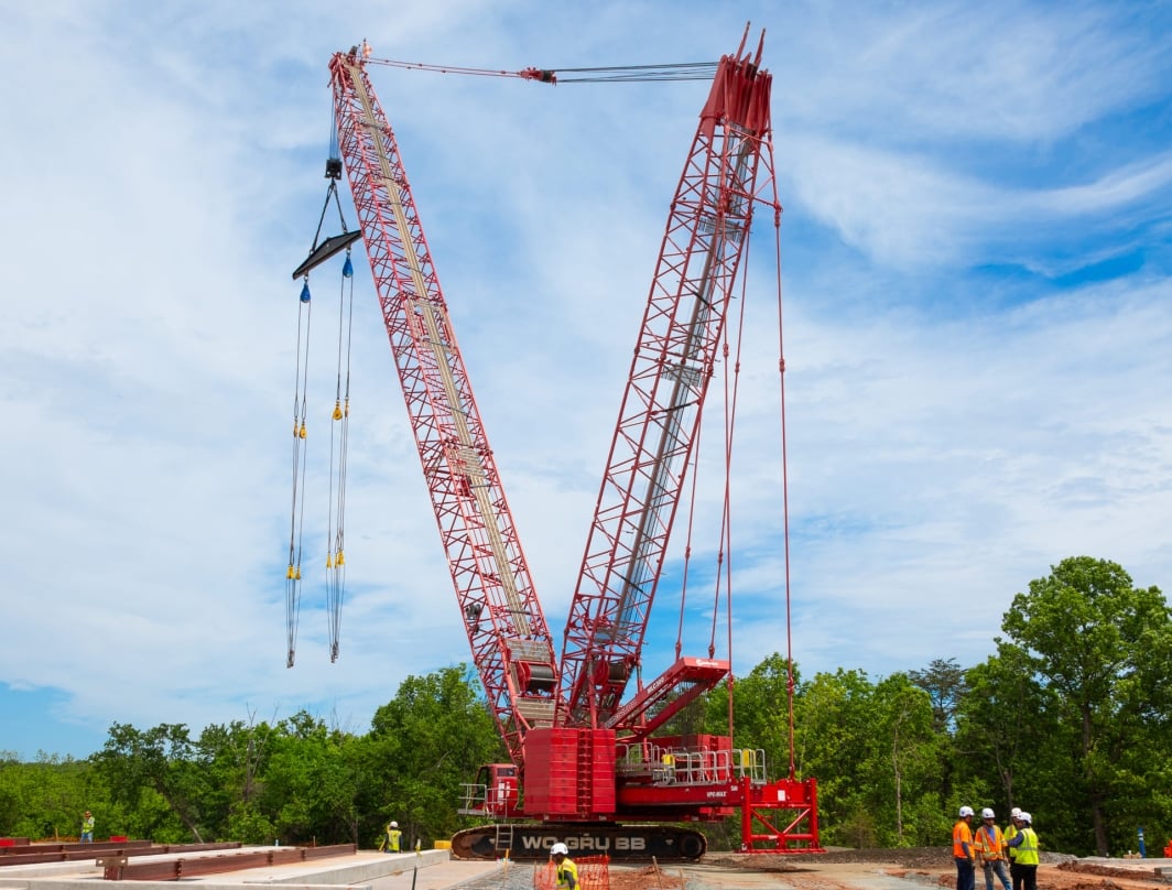 Construction site with the heavy machinery and workers